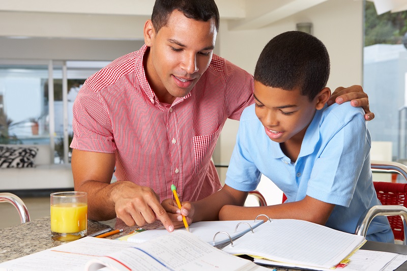 bigstock-Father-Helping-Son-With-Homework