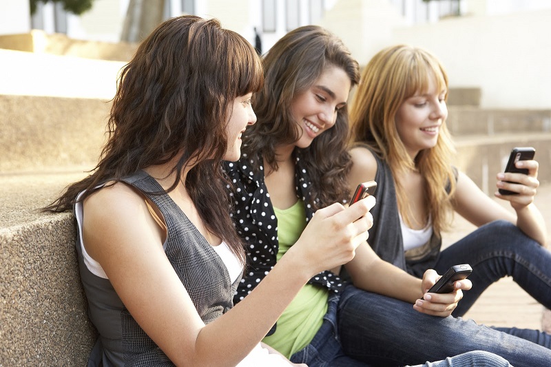 Teens with mobile phones