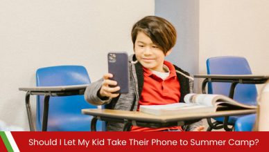 Kid using smartphone in classroom